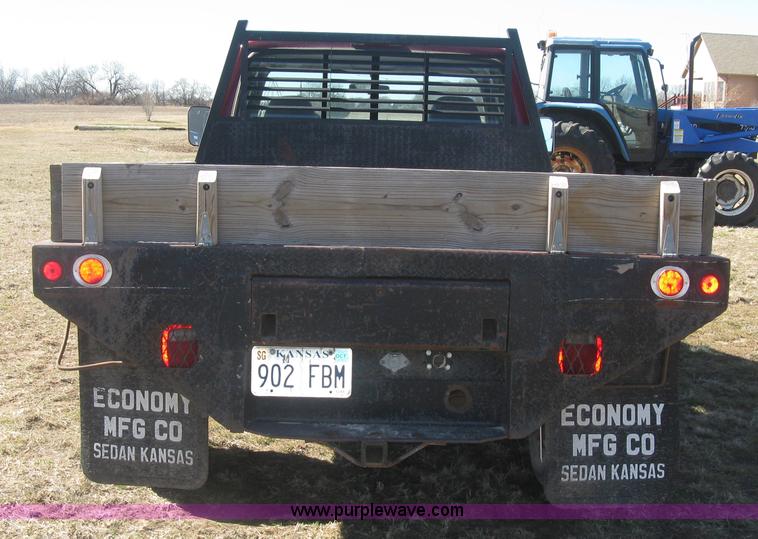 image for item J2882 1995 Ford F250 HD XLT SuperCab flatbed pickup truck