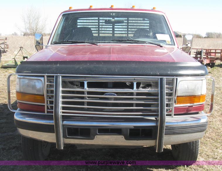 image for item J2882 1995 Ford F250 HD XLT SuperCab flatbed pickup truck
