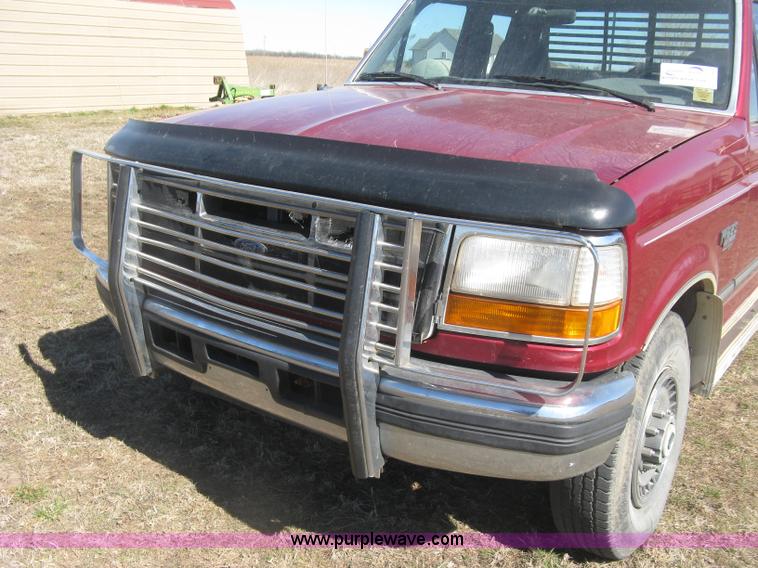image for item J2882 1995 Ford F250 HD XLT SuperCab flatbed pickup truck