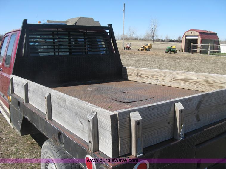 image for item J2882 1995 Ford F250 HD XLT SuperCab flatbed pickup truck