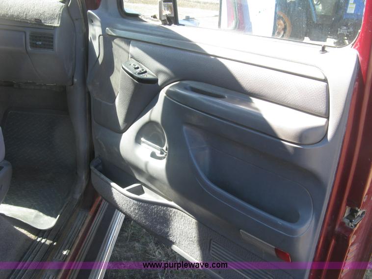 image for item J2882 1995 Ford F250 HD XLT SuperCab flatbed pickup truck