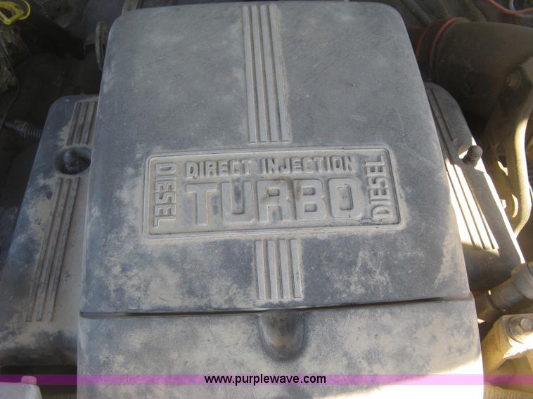 image for item J2882 1995 Ford F250 HD XLT SuperCab flatbed pickup truck