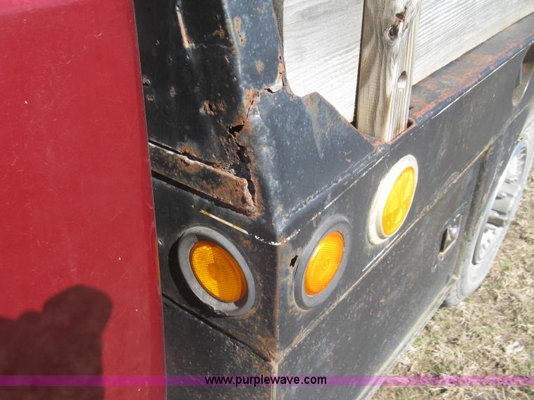 image for item J2882 1995 Ford F250 HD XLT SuperCab flatbed pickup truck