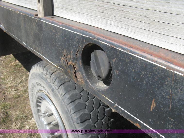 image for item J2882 1995 Ford F250 HD XLT SuperCab flatbed pickup truck