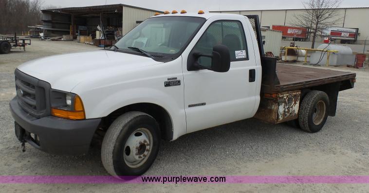 image for item K4266 1999 Ford F350 Super Duty XL flatbed pickup truck