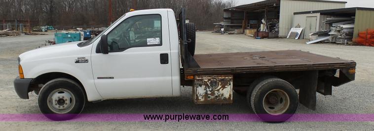 image for item K4266 1999 Ford F350 Super Duty XL flatbed pickup truck