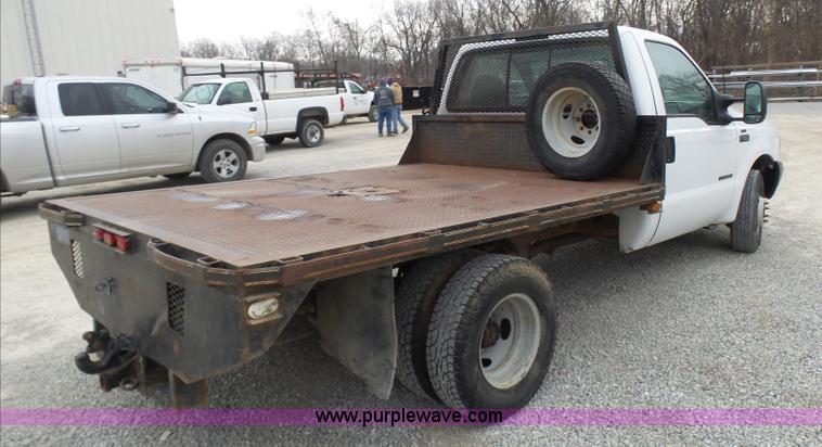 image for item K4266 1999 Ford F350 Super Duty XL flatbed pickup truck