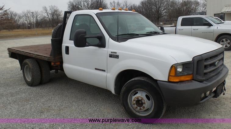 image for item K4266 1999 Ford F350 Super Duty XL flatbed pickup truck