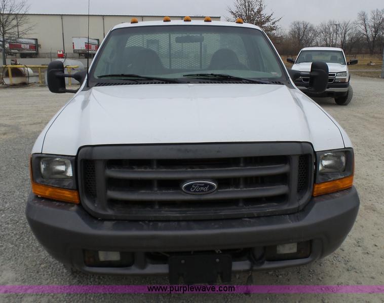 image for item K4266 1999 Ford F350 Super Duty XL flatbed pickup truck