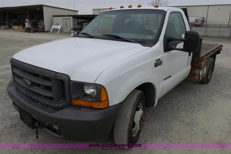image for item K4266 1999 Ford F350 Super Duty XL flatbed pickup truck
