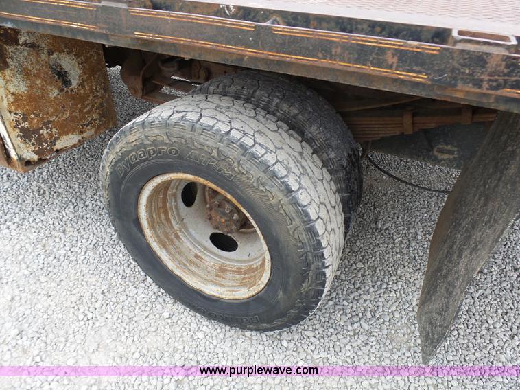 image for item K4266 1999 Ford F350 Super Duty XL flatbed pickup truck