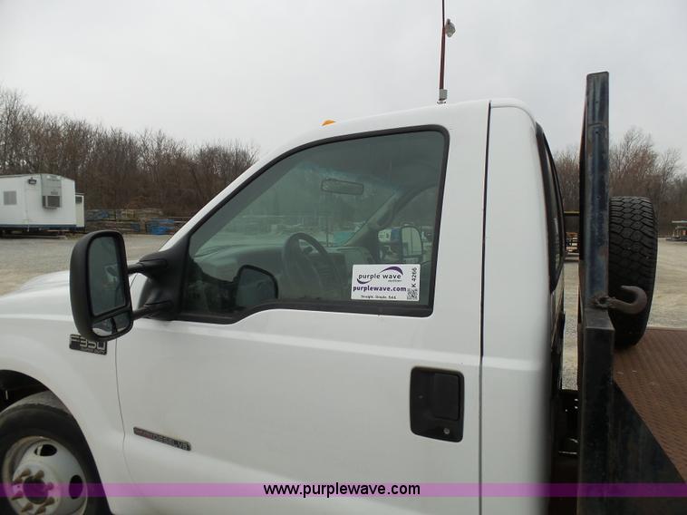 image for item K4266 1999 Ford F350 Super Duty XL flatbed pickup truck