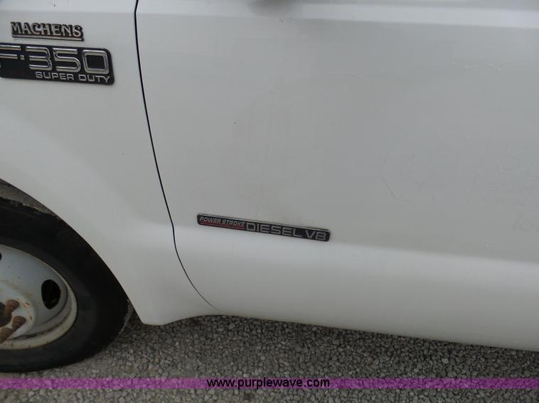 image for item K4266 1999 Ford F350 Super Duty XL flatbed pickup truck