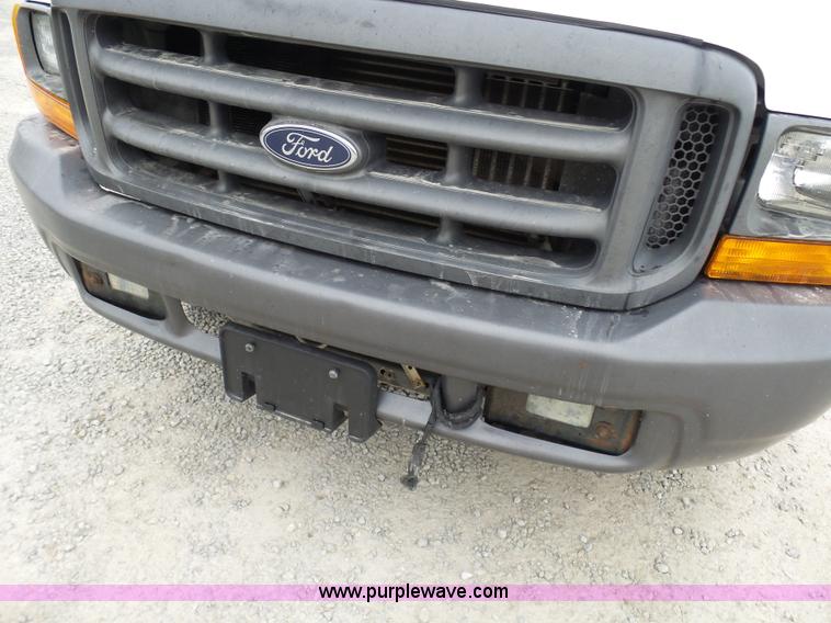 image for item K4266 1999 Ford F350 Super Duty XL flatbed pickup truck