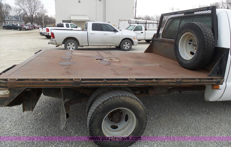 image for item K4266 1999 Ford F350 Super Duty XL flatbed pickup truck