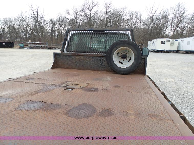image for item K4266 1999 Ford F350 Super Duty XL flatbed pickup truck