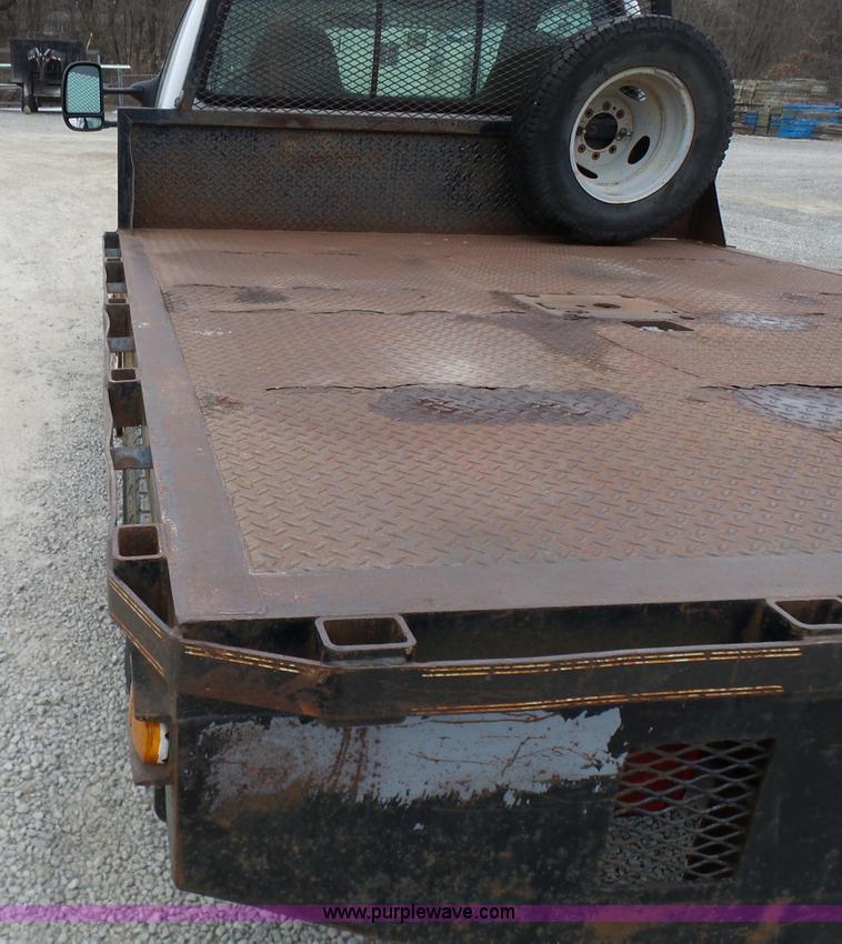 image for item K4266 1999 Ford F350 Super Duty XL flatbed pickup truck