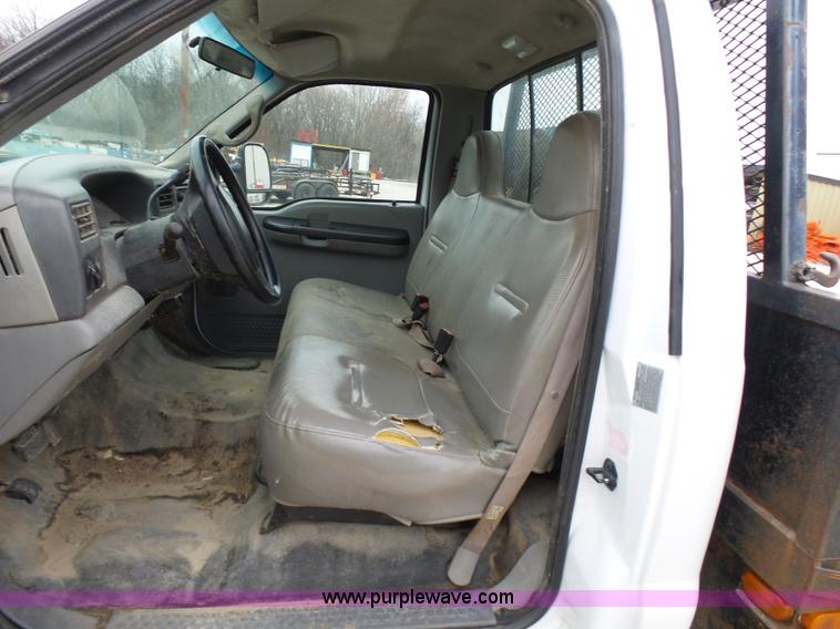 image for item K4266 1999 Ford F350 Super Duty XL flatbed pickup truck