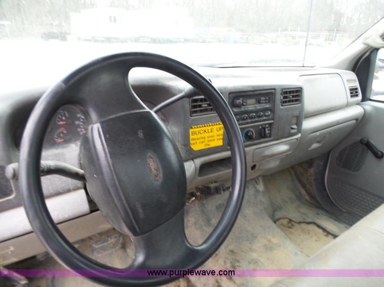 image for item K4266 1999 Ford F350 Super Duty XL flatbed pickup truck