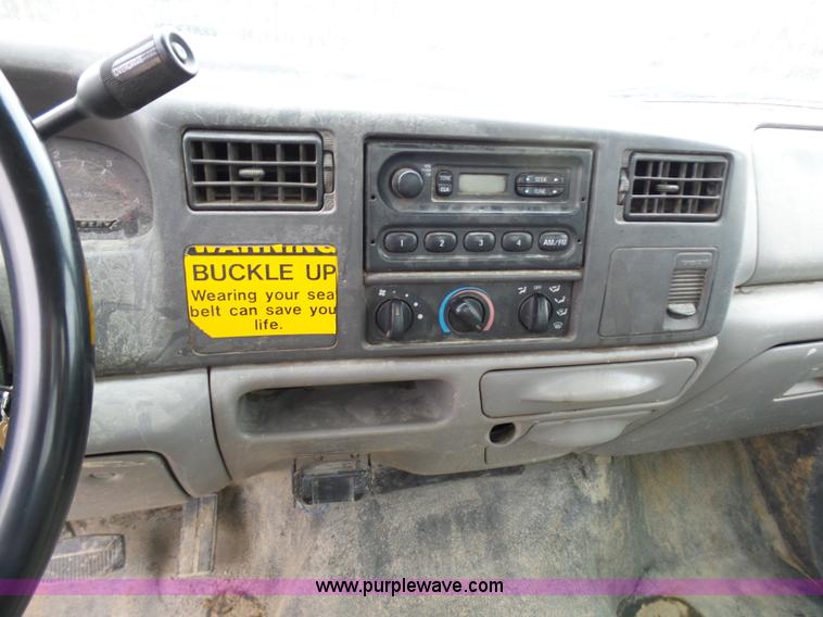 image for item K4266 1999 Ford F350 Super Duty XL flatbed pickup truck