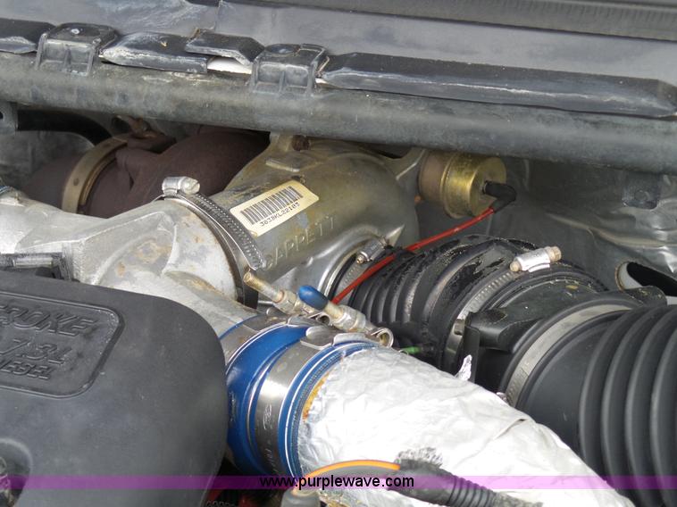 image for item K4266 1999 Ford F350 Super Duty XL flatbed pickup truck