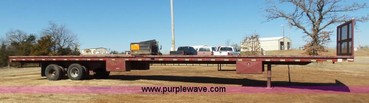 image for item K5779 2000 Big Tex 24-MF48 flatbed trailer