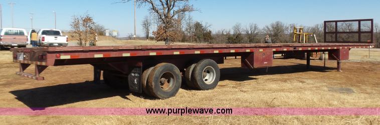image for item K5779 2000 Big Tex 24-MF48 flatbed trailer