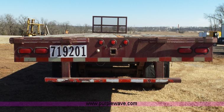 image for item K5779 2000 Big Tex 24-MF48 flatbed trailer