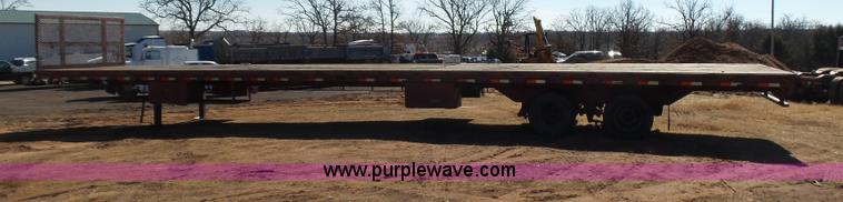 image for item K5779 2000 Big Tex 24-MF48 flatbed trailer