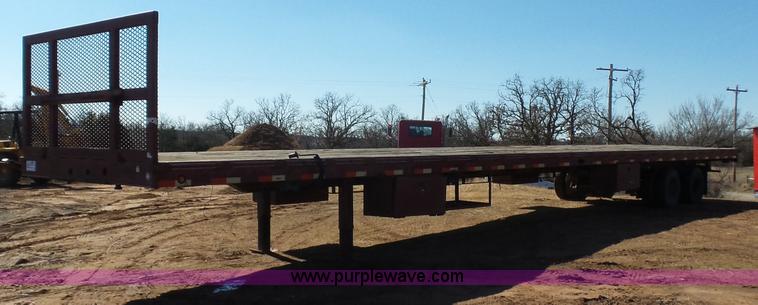 image for item K5779 2000 Big Tex 24-MF48 flatbed trailer