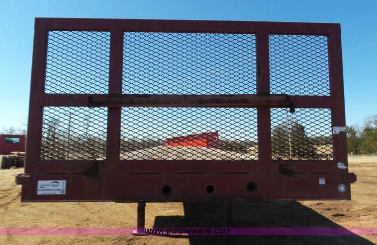 image for item K5779 2000 Big Tex 24-MF48 flatbed trailer