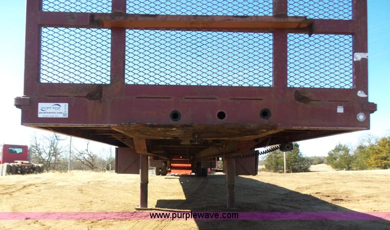 image for item K5779 2000 Big Tex 24-MF48 flatbed trailer
