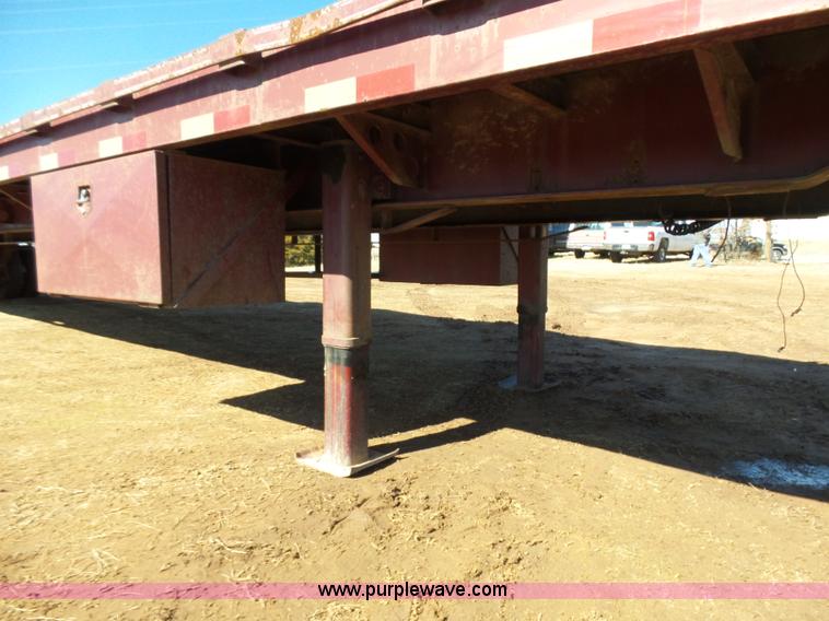 image for item K5779 2000 Big Tex 24-MF48 flatbed trailer
