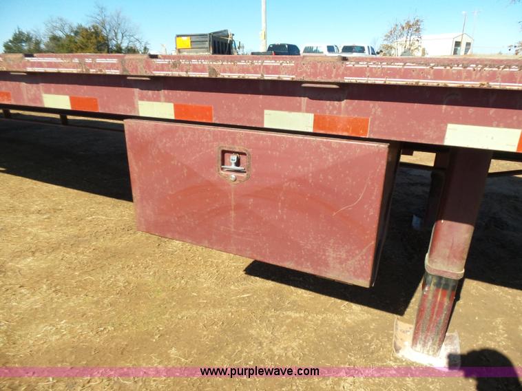 image for item K5779 2000 Big Tex 24-MF48 flatbed trailer