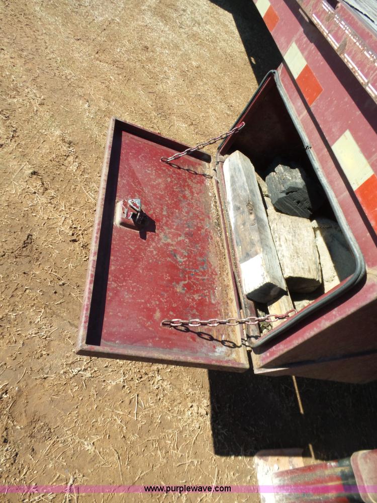 image for item K5779 2000 Big Tex 24-MF48 flatbed trailer