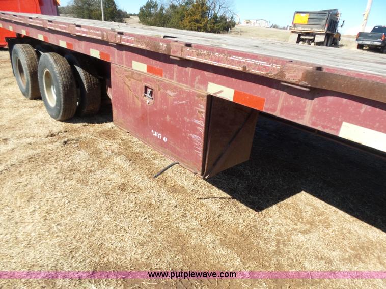 image for item K5779 2000 Big Tex 24-MF48 flatbed trailer