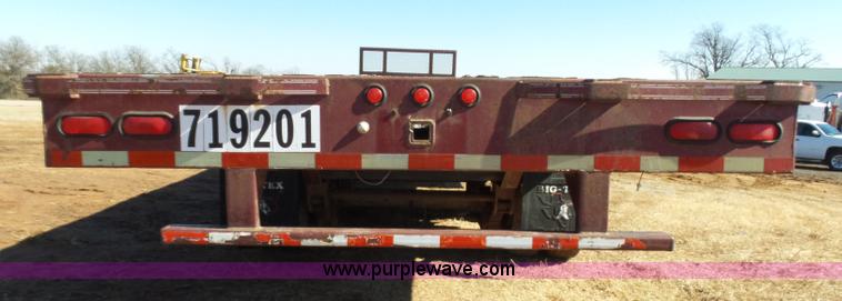 image for item K5779 2000 Big Tex 24-MF48 flatbed trailer