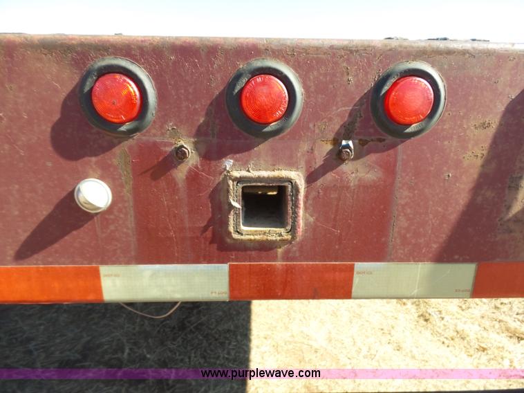 image for item K5779 2000 Big Tex 24-MF48 flatbed trailer