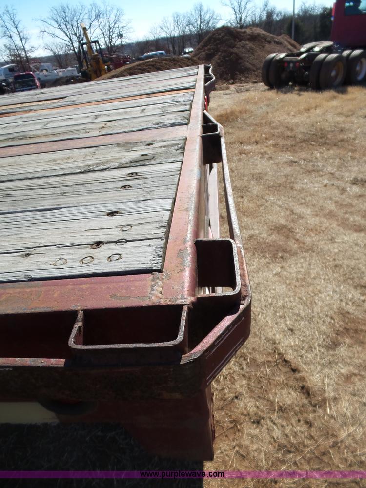 image for item K5779 2000 Big Tex 24-MF48 flatbed trailer