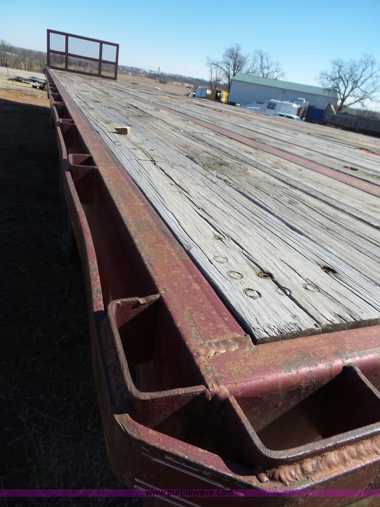 image for item K5779 2000 Big Tex 24-MF48 flatbed trailer