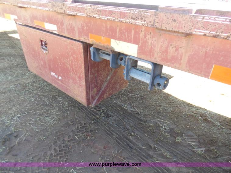 image for item K5779 2000 Big Tex 24-MF48 flatbed trailer