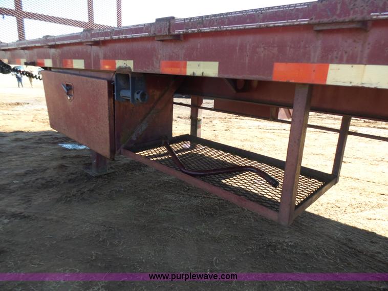 image for item K5779 2000 Big Tex 24-MF48 flatbed trailer