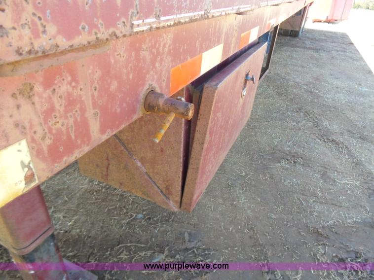 image for item K5779 2000 Big Tex 24-MF48 flatbed trailer