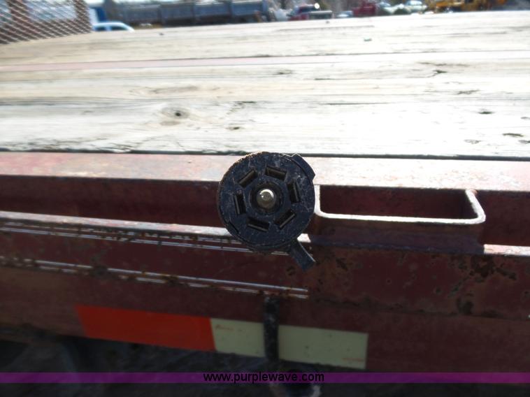 image for item K5779 2000 Big Tex 24-MF48 flatbed trailer