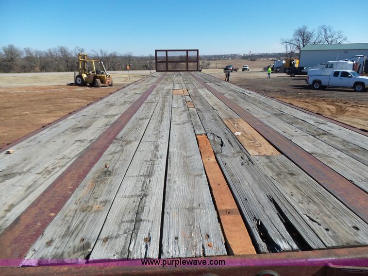 image for item K5779 2000 Big Tex 24-MF48 flatbed trailer