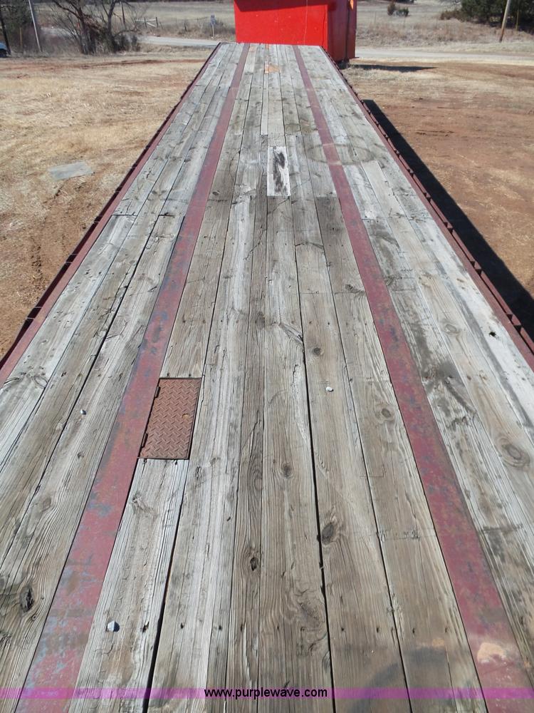 image for item K5779 2000 Big Tex 24-MF48 flatbed trailer