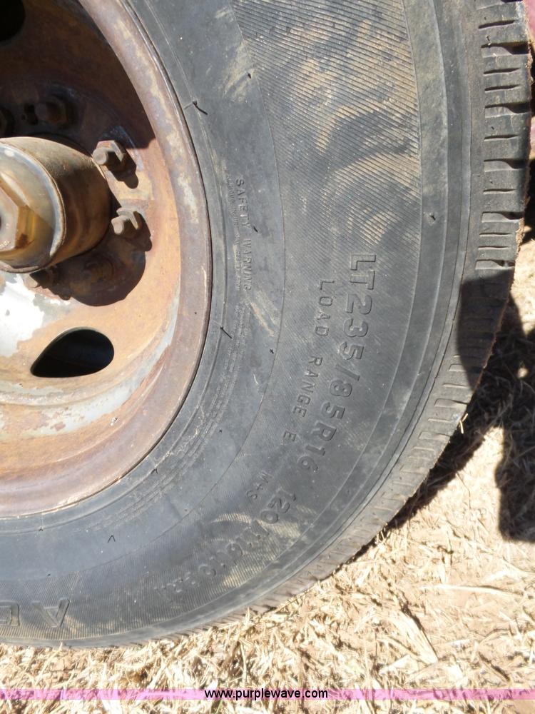 image for item K5779 2000 Big Tex 24-MF48 flatbed trailer