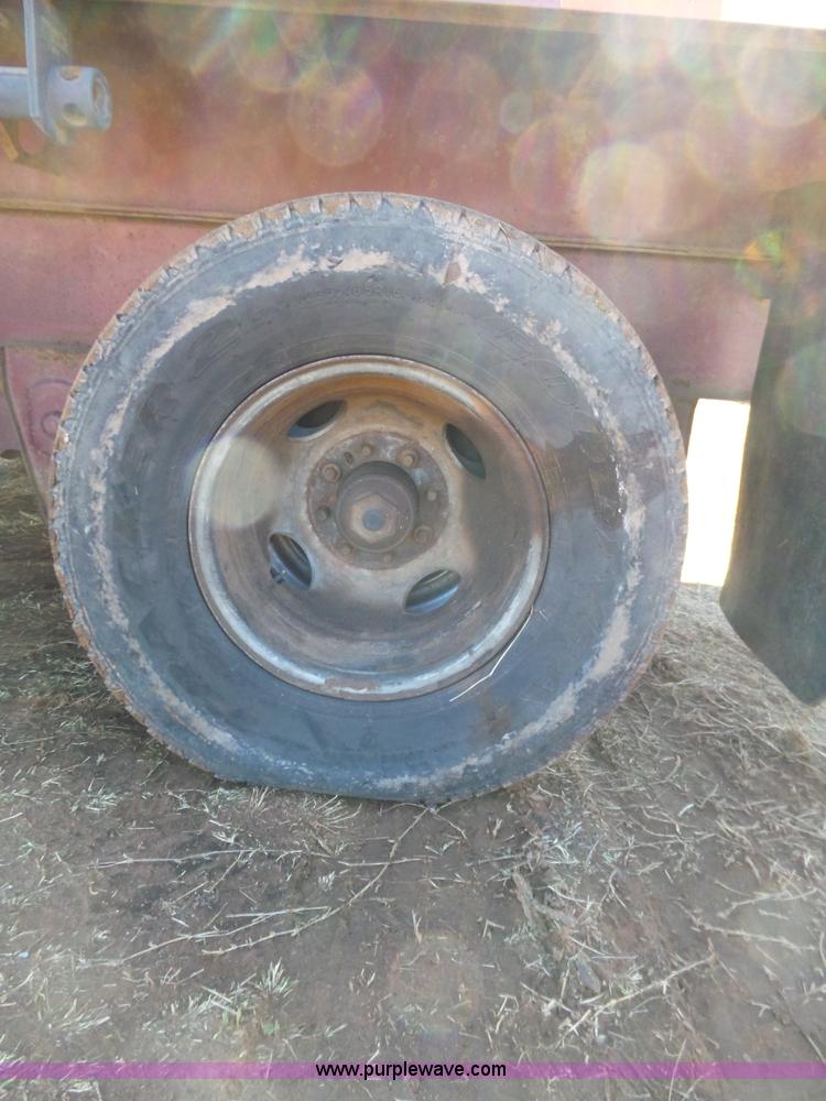 image for item K5779 2000 Big Tex 24-MF48 flatbed trailer