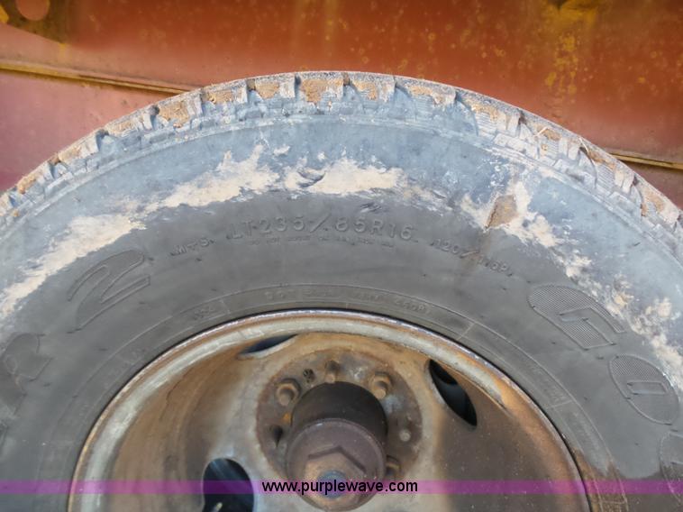 image for item K5779 2000 Big Tex 24-MF48 flatbed trailer