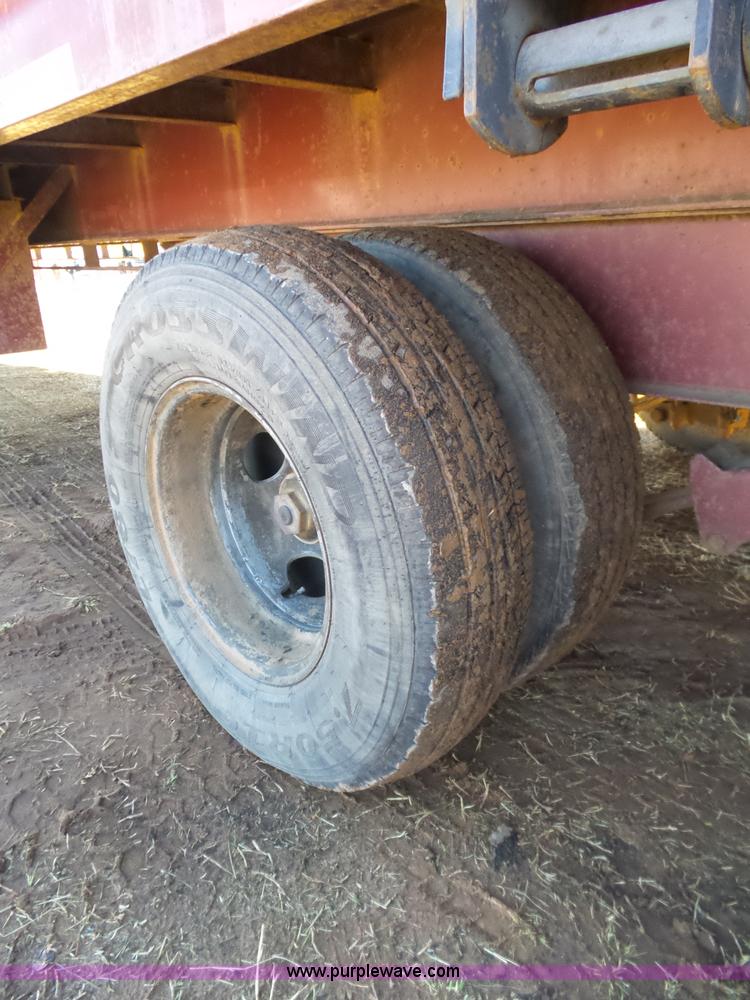 image for item K5779 2000 Big Tex 24-MF48 flatbed trailer